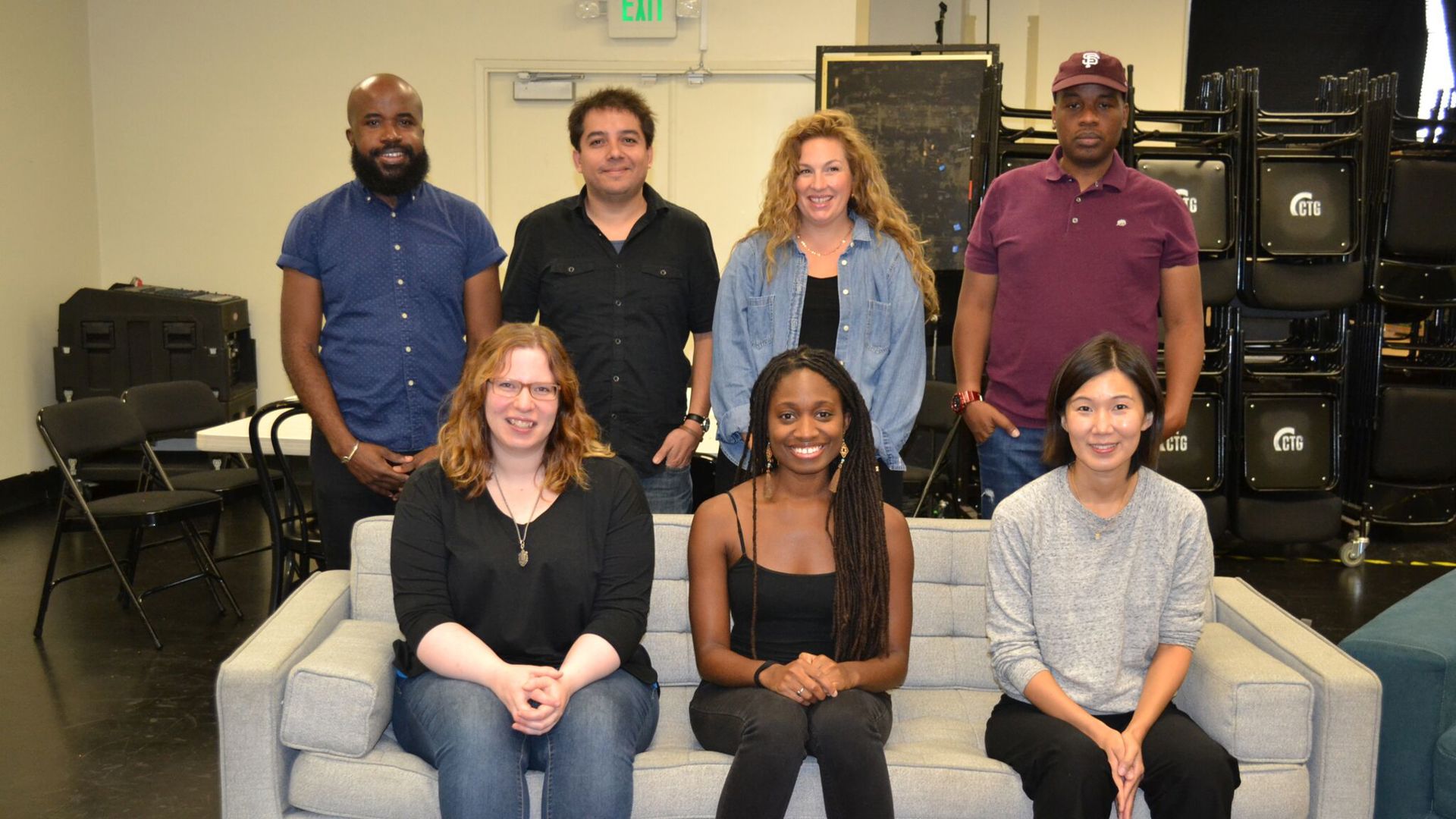 seven Los Angeles writers standing and sitting